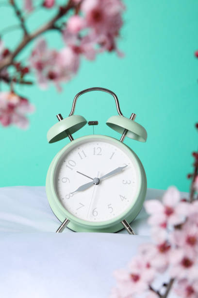 istock Concept of sleep and wake up with alarm clock 2190769728