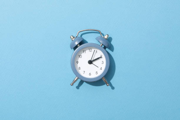 istock Concept of sleep and wake up with alarm clock 2190770022