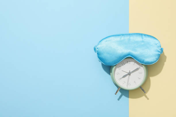 istock Concept of sleep and wake up with alarm clock 2190770039
