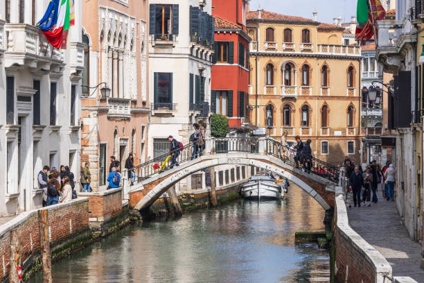 Italy, Venice. Small bridge over a canal.