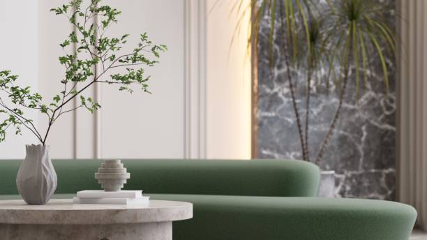 istock 3D rendering of A serene interior space with green sofa, decorative vase, and natural elements, creating a calming atmosphere. 2190777109