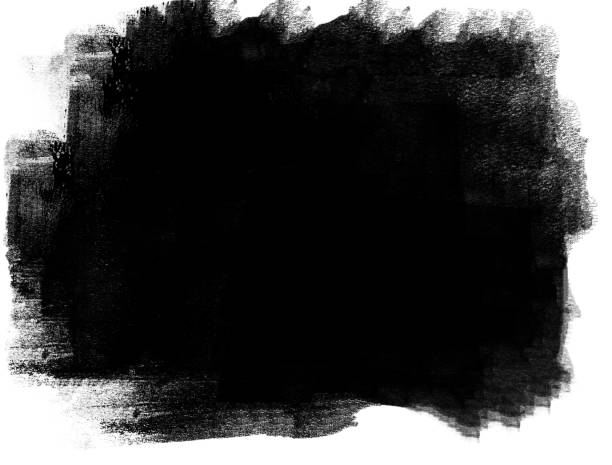 istock A spot of black paint with uneven edges on white 2190778021