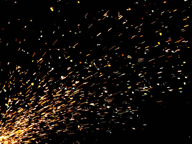 istock A black background with a lot of sparks and fire 2190778247