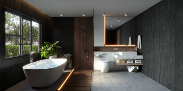 istock A modern bathroom with a sleek bathtub, natural lighting, and elegant design elements, creating a serene and stylish atmosphere. 3D rendering 2190779834