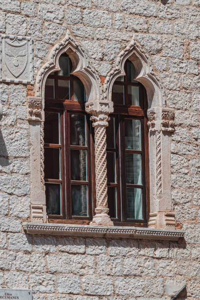 istock 03.07.24 Porec Croatia Wonderful different window decorations on historic houses 2190780025