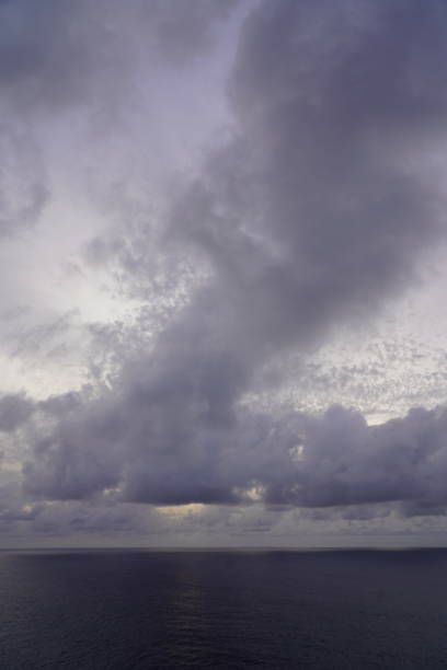 The sky with gray clouds over the ocean. Clouds over the Atlantic Ocean. Beautiful clouds over the sea.