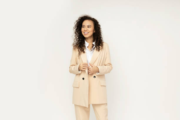 istock Attractive businesswoman in a suit on a light background 2190782110
