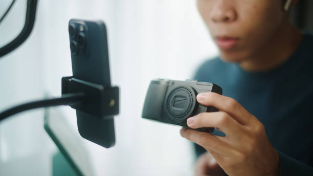 istock Young blogger or influencer review how to using a camera. 2190784470