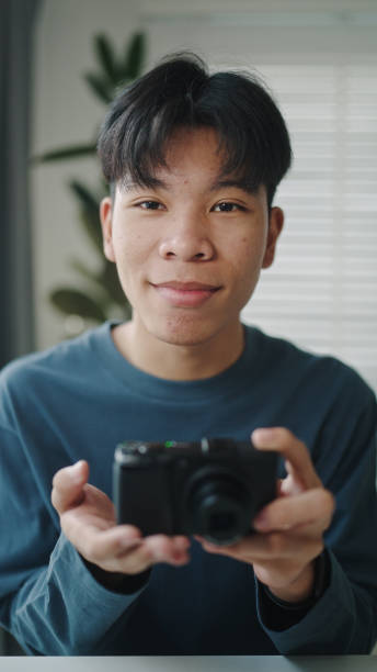 istock Blogger or influencer review how to using a camera. 2190784484