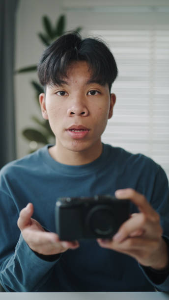 istock Blogger or influencer review how to using a camera. 2190784485
