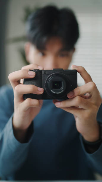 istock Blogger or influencer review how to using a camera. 2190784497