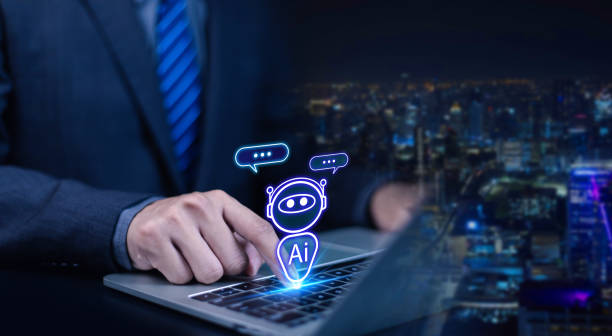 istock Businessman chatting with AI or artificial intelligence technology. A man uses a laptop computer to chat with an intelligent AI. 2190787832
