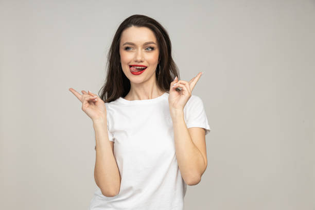 istock A beautiful girl in a good mood, on a light background 2190790944