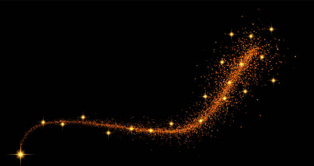 istock Vector image with a wave of gold shimmering confetti and stardust. The background is decorated with magical gold sparkles on a dark background, creating an effect of luxury and festive glow. 2190793544