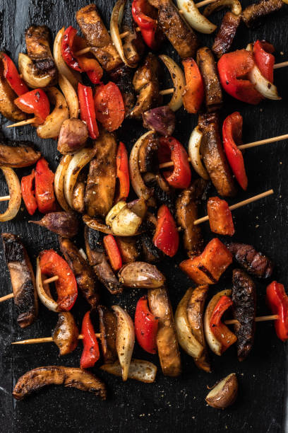 istock Grilled mushrooms, fresh vegetables and herbs vegetarian meal 2190796814