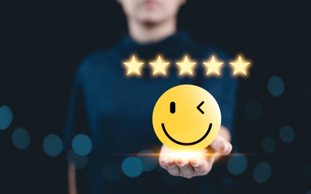 istock Customer review satisfaction feedback survey concept. Customer experience, best excellent service rating for satisfaction present by hand of client showing smile face with excellent rating five stars. 2190797933