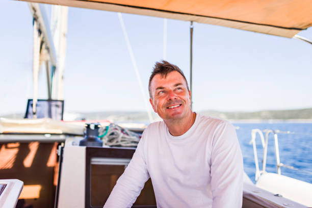 istock Crew member enjoying sailing on sailboat 2190798676