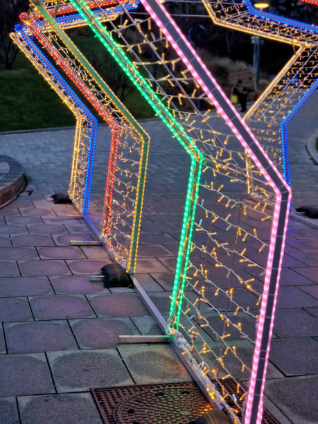 istock decorations and light parks are decorated with colorful light cables and furry plastic felt in the shape of a wall. brick and snow. 2190799640