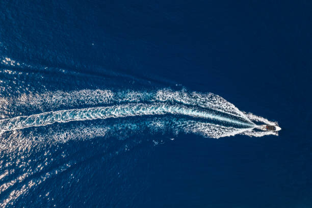 istock Speedboat racing along the open sea 2190803362