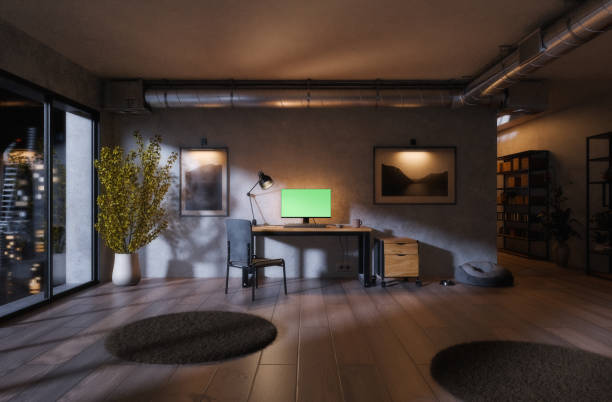 istock Modern minimalist workspace with natural light and elegant design elements with green screen monitor 2190803715