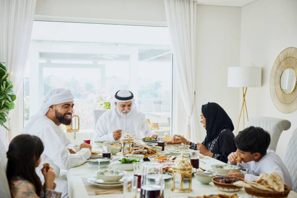 istock Happy middle eastern family eating lunch at home 2190807609