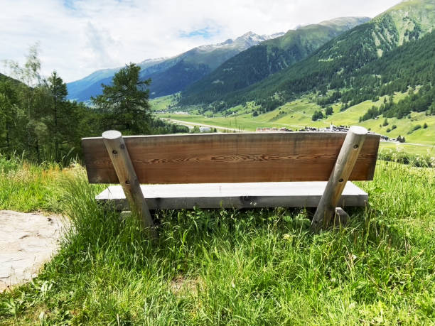 istock Bench - Alps and Forest landscape with river Rhain in Switzerland 2190808081