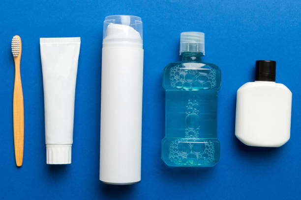 istock Mockup for bathing products top view flat lay, spa razor, toothpaste, soap, gel and other various accessories. Cosmetics for skin health. Bath Mockup for your logo 2190808411
