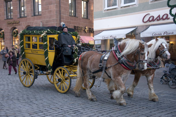 Nuremberg, Germany - December 17, 2013: Old horse-drawn carriage, strolling through the historic center of the city