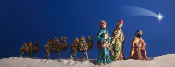 istock Epiphany. Three Wise Men and decorated camels 2190810411