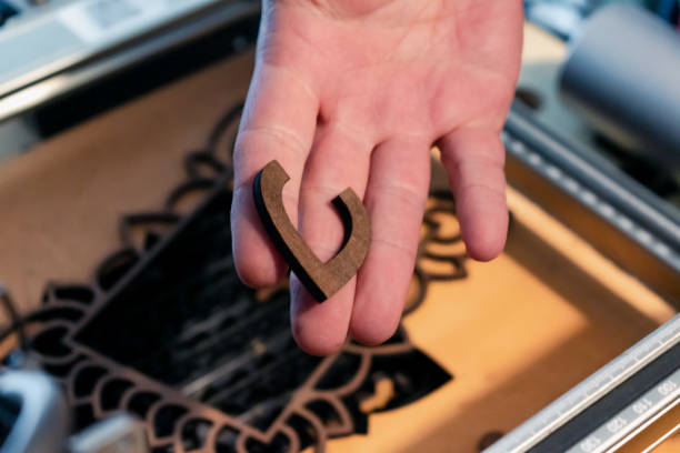 istock Laser engraving and cutting, using reclaimed wood, upcycling concept 2190811276