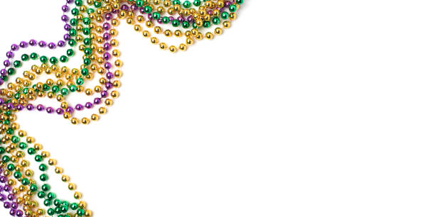Mardi gras beads on white background Mardi Gras beads isolated on white background Bead stock pictures, royalty-free photos & images