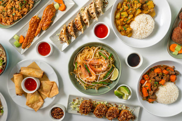 Set of Thai dishes top view on white background