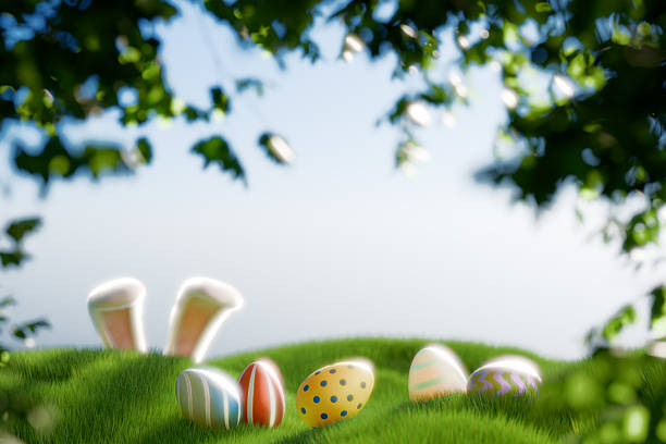 Colorful Easter eggs on green grass with a playful bunny hidden behind the foliage. 3d rendering