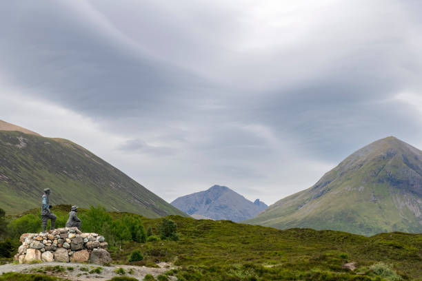 Sligachan, UK-19 June 2024; Sculpture Heroes of the Hills by Stephen Tinney in Northwest Highlands of Scotland, Isle of Skye, dedicated to mountaineers John Mackenzie and Norman Collie