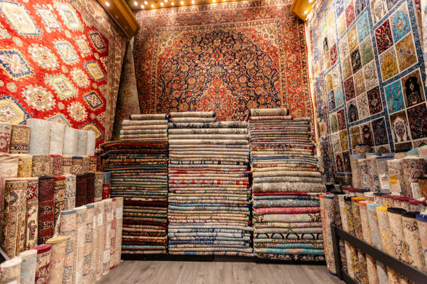 istock Array of vibrant, stacked carpets in shop display 2190835694