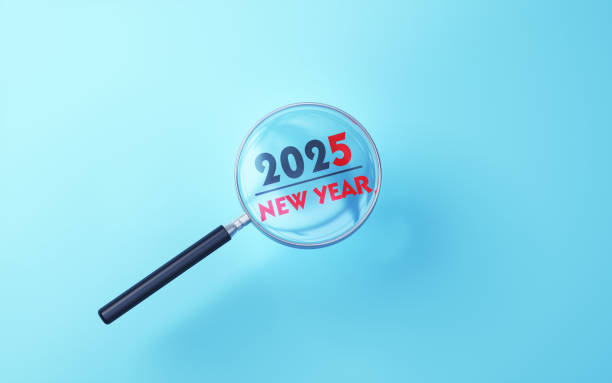 istock Red Black New Year 2025 Selected with Metallic Magnifying Glass on Soft Blue Background 2190836034