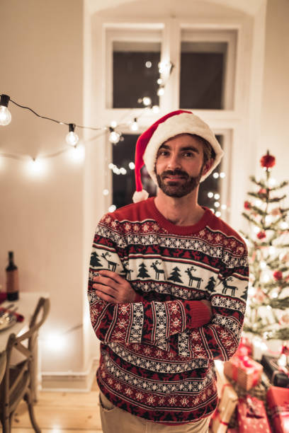 istock man showing his present at home 2190837798