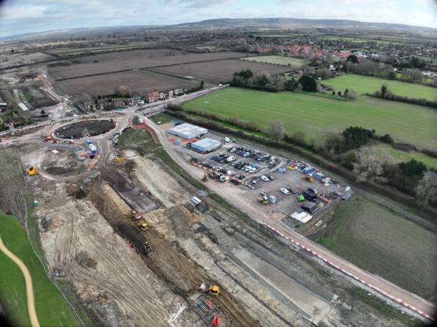 istock Aerial view of construction site and fields. 2190838582