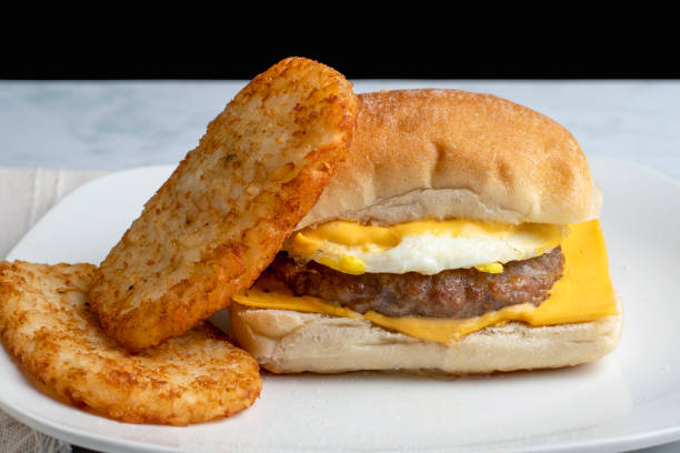 istock sausage patty fried egg , and cheese breakfast sandwich 2190841731