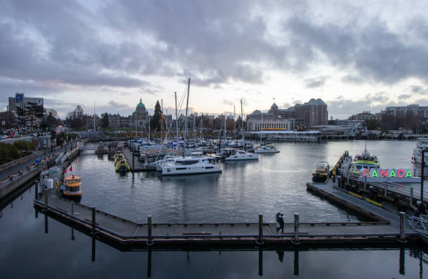 Victoria, British Columbia, Canada - December 7, 2024: Boats moored in the Victoria Harbour on a calm December evening.
