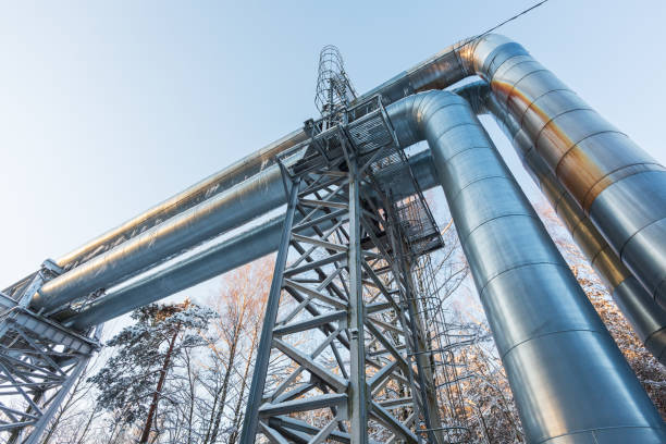 Industrial pipelines on a pipe bridge on a cold winter day