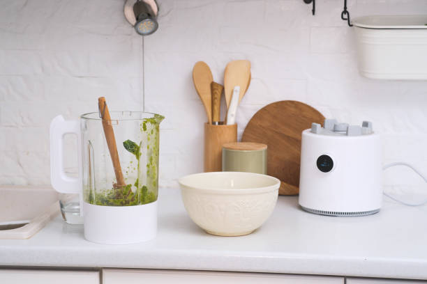 istock A bright kitchen with a powerful dirty blender, mixing bowl, and utensils, ideal for healthy cooking and meal on white kitchen. 2190850909