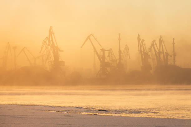 A sunrise over the harbor of Riga on a spring morning, view from Kipsala