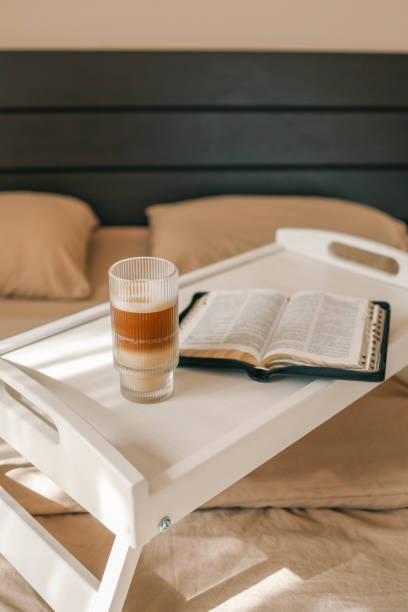 istock Open Bible and coffee station, morning reading 2190851902