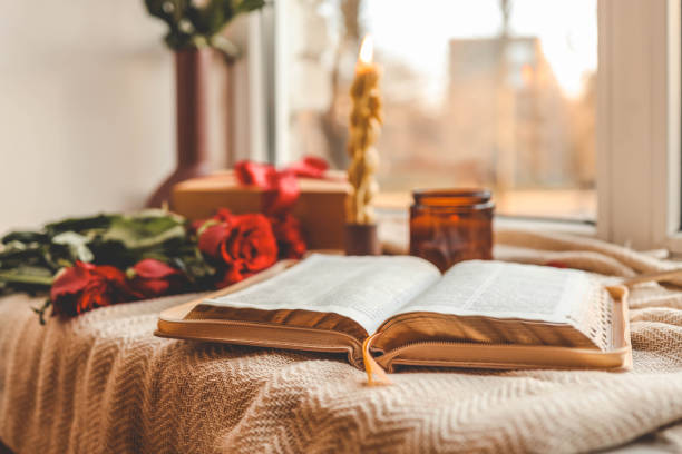 istock Open Bible in a cozy home interior. Good morning. 2190851976