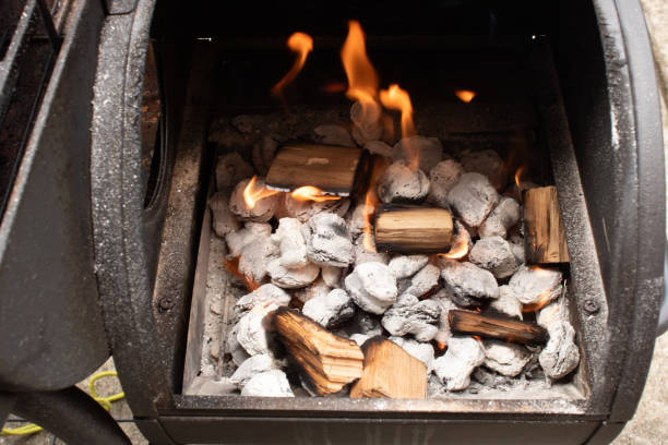 istock Charcoal with fire ready to cook food in a small grill 2190856273