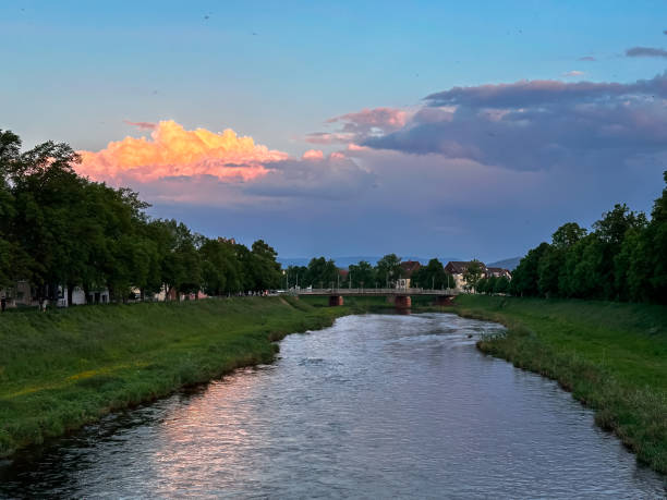 istock River with a bridge over it and a beautiful sunset in the background 2190856365