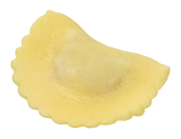 istock Raw ravioli with prosciutto on isolated background 2190856376