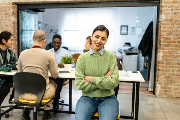 istock Portrait of a cheerful woman at work 2190858714