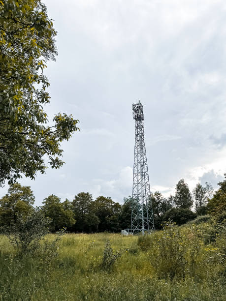 istock Tall tower is in the middle of a field 2190861289